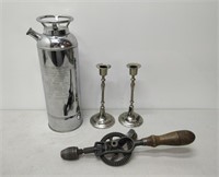 primitive hand drill, fire extinguisher, candle