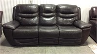 Leather dual power recline sofa