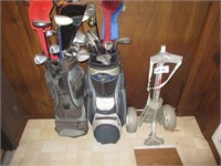 2 bags of golf clubs and 2 wheel cart