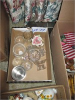 box of home decor items