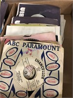 45 RPM records in sleeves