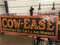 Cow-Ease tin sign, 14x42