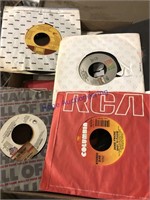 45 RPM records in sleeves