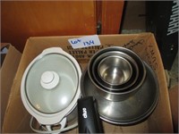 small crock pot and metal bowls