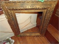 Large ornate wooden picture frame