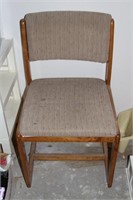 Upholstered chair on wooden frame