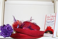Lot of two red hats and book