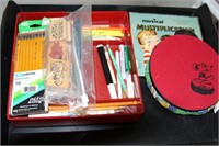 Plastic tray of office and teaching supplies