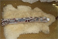 Sheepskin rug and lighthouse pillow