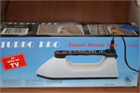 Travel steam iron in box