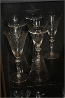 Set of 7 glass stemware, floral molded print