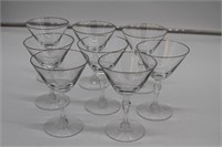 Set of 8 crystal stemware, silver tone rim
