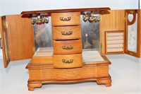 Wooden jewelry box with many drawers
