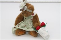 Barrington bear in a strawberry dress carrying