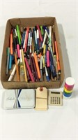 Lot of pens including stamp pad and glue stick