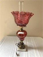 Cranberry  glass lamp on marble and brass base