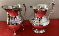 2 unmatched plated silver water pitchers