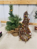 Two small country style Christmas trees