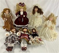 Assortment of 7 Porcelain Face Dolls