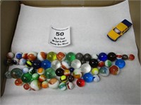 VINTAGE LARGE AND SMALL MARBLES AND 2001 TOY CAR