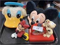 Lot of Disney toys, clock, hats.