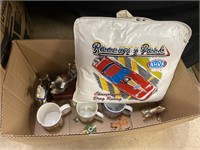 Lot of mugs, cushion, carousel figures.