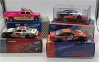 4 1:24th Scale Die Cast Cars