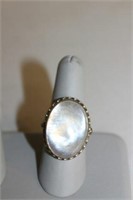 SILVER  RING WITH PEARLLIKE COLORED STONE