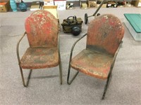 Pair of rustic metal lawn chairs