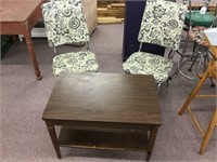 Two vinyl covered chairs and end table