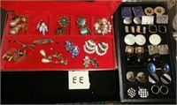 jewelry box full of sets of cuff links & earrings