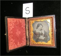 Daguerreotype image of girl with letter in 2 1