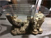 Unique glass top tiger and cubs table