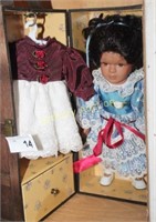DOLL W/ CLOTHES IN CASE
