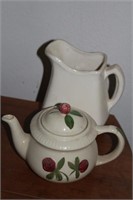 Ceramic pitcher and teapot, teapot handle shows