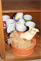 Pig centerpiece and holiday coffee mugs