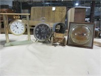 Three clocks and covered wagon toy