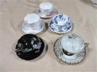 Five teacups and saucers