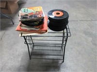 Funky wire record stand and stack of vinyl