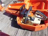 Stihl 009L chainsaw with case