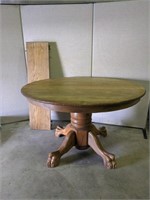 Round Tiger Oak Claw Foot Table