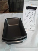 3 bread pans and grater