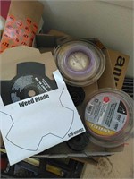 Box of trimmer line, weed blade and accessories