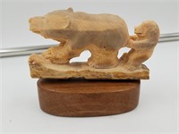 Fossilized core walrus Ivory relief carving of a b