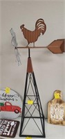 Metal windmill with chicken