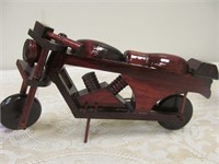Model motorcycle, reddish wood