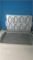 Gingerbread man baking sheet and another cookie