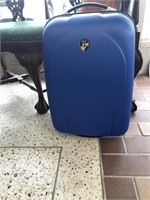 Heys hard shell suitcase with wheels in blue