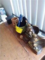 brass book ends/pottery