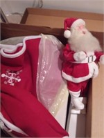 box of Christmas decorations/Santas